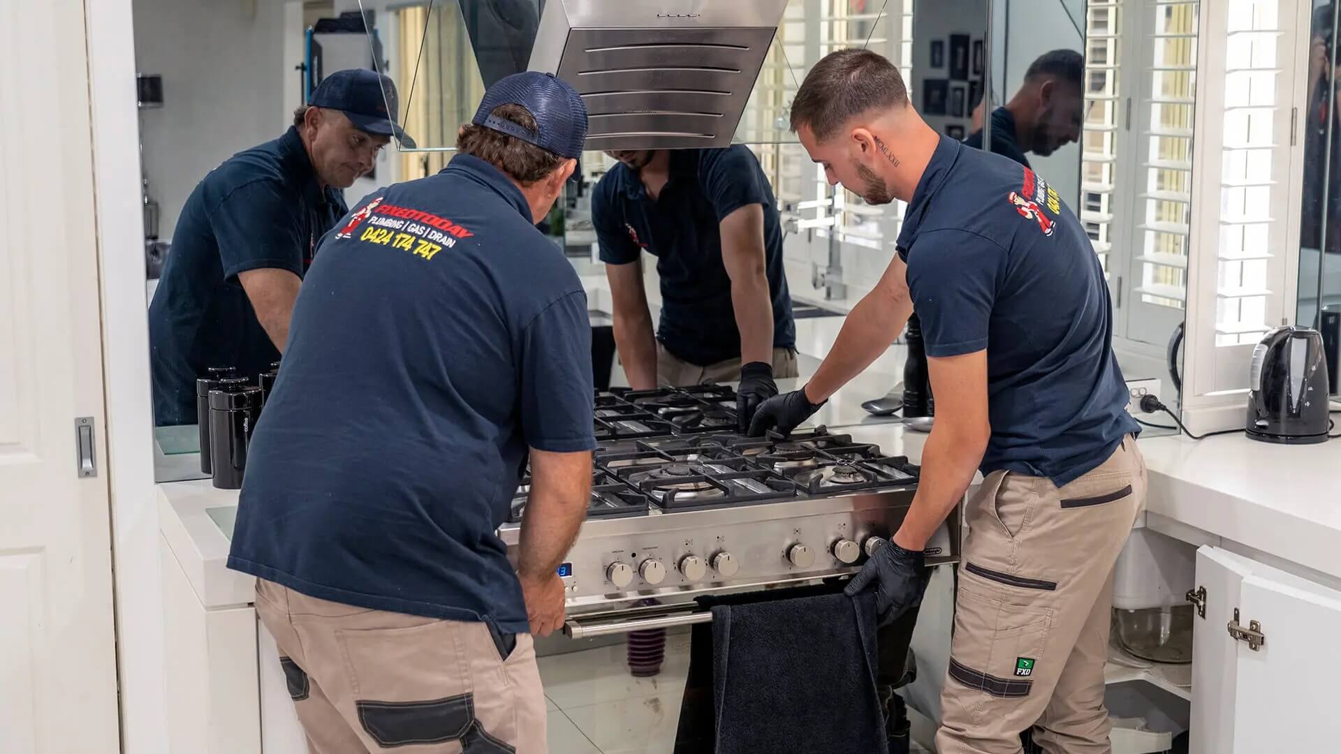 Licensed gas fitter installing gas hot water system